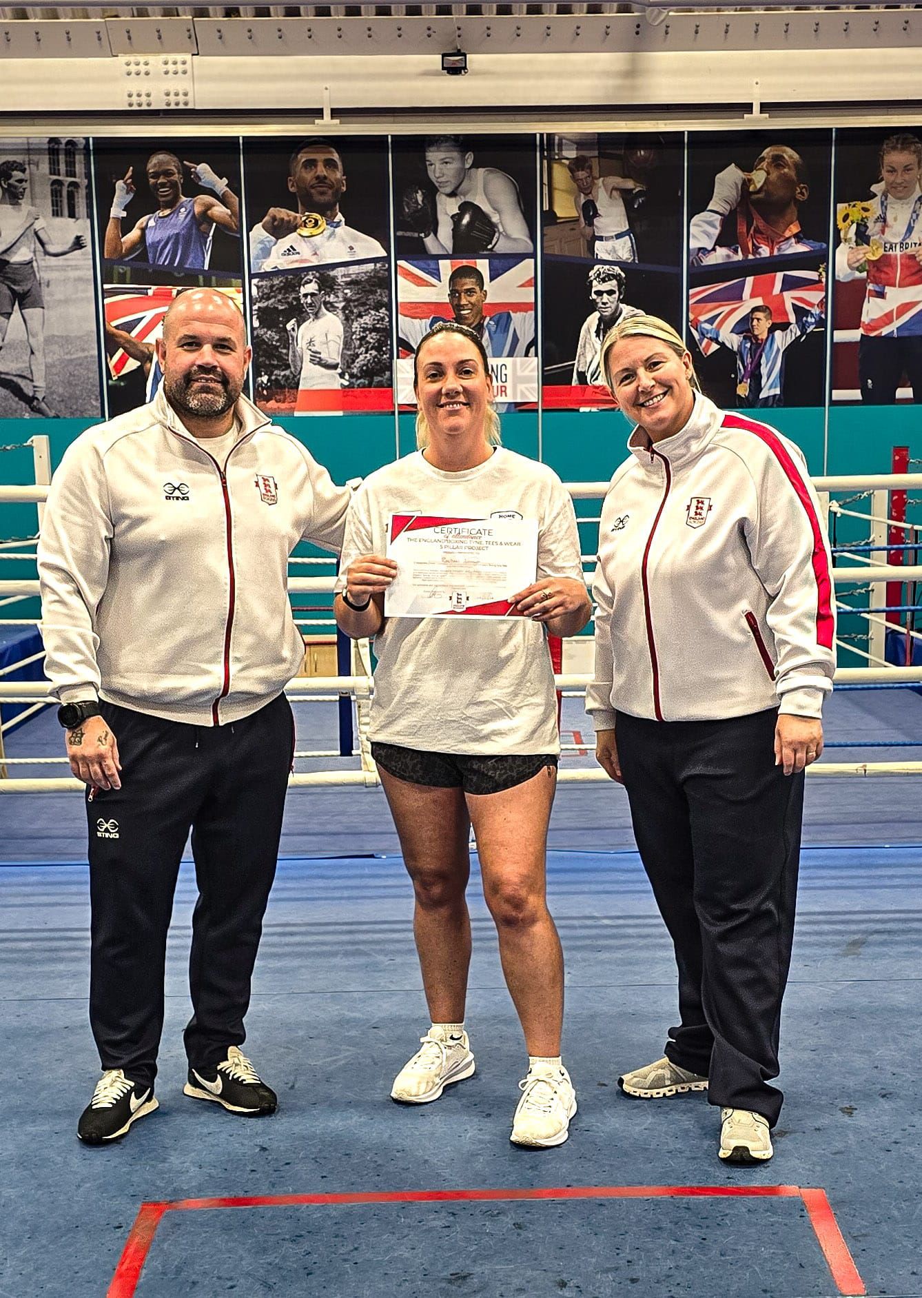 Rachel receiving her BADST Framework certificate at England Boxing